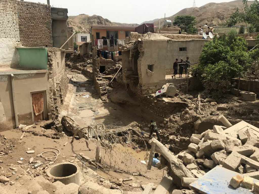 housing damaged in flash floods. 